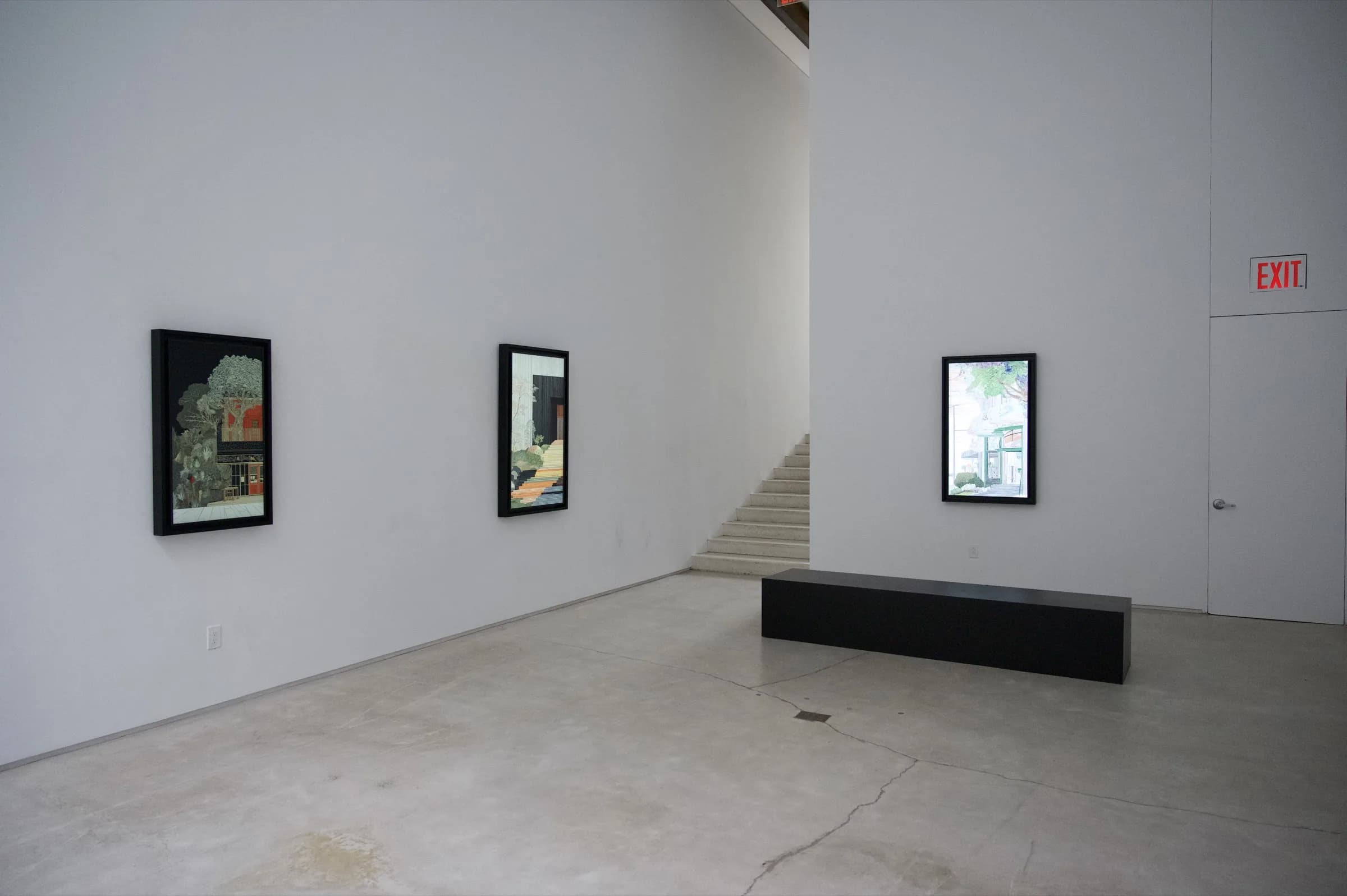 Installation view showing staircase between paintings.